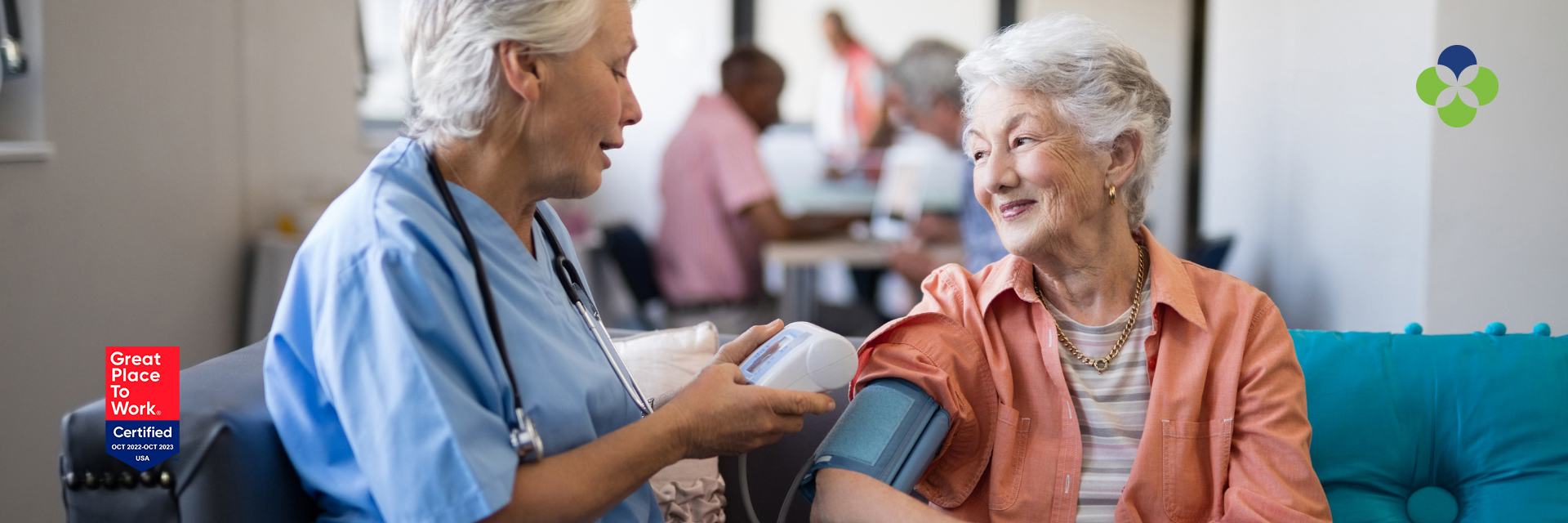 nurse taking patients blood pressure